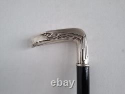 Poignée de canne Art Déco en forme de tête d'aigle en argent 900 datée de 1909 L 88 CM